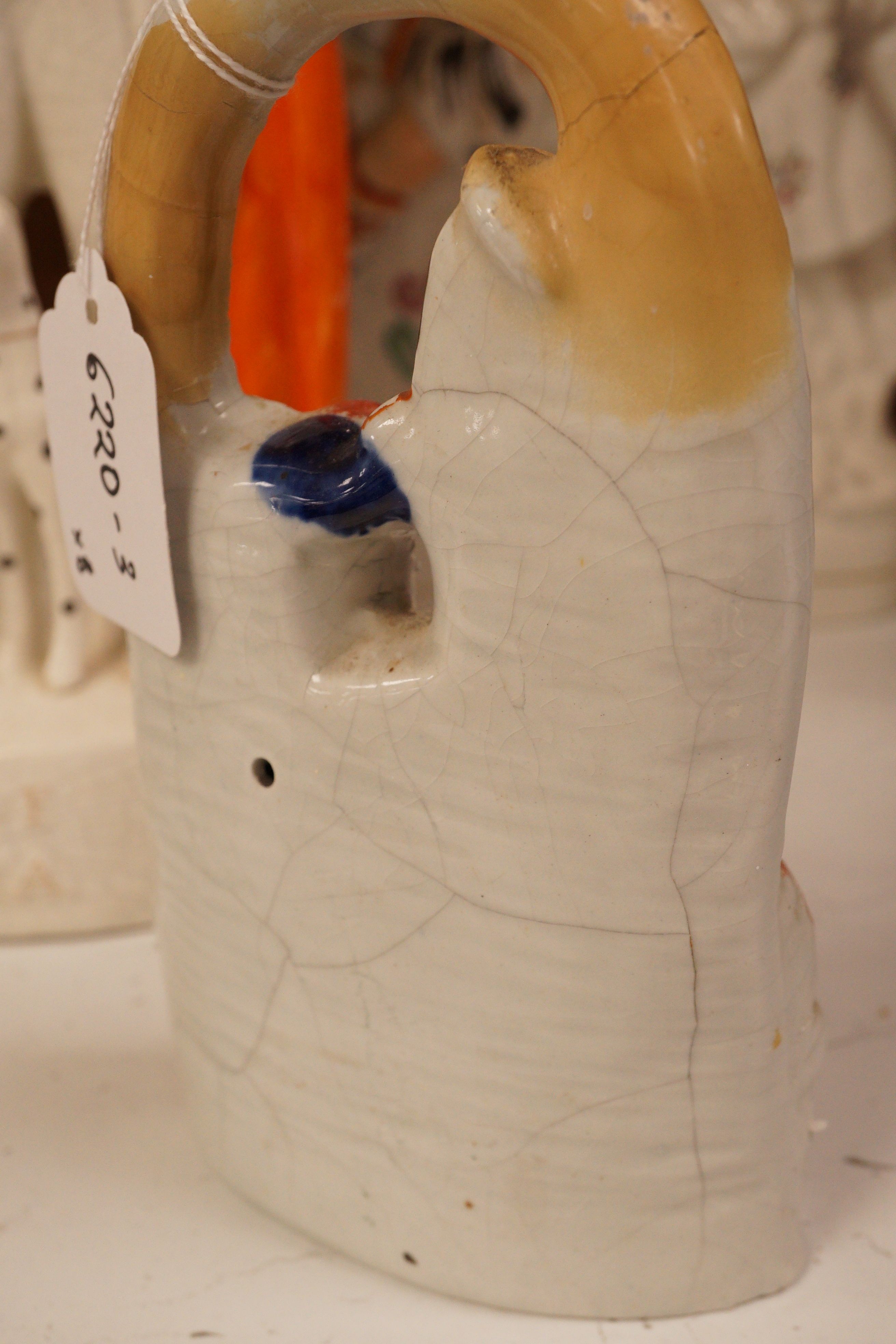 A group of Staffordshire pottery groups, tallest 38cm